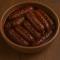 Egyptian sausage with pomegranate molasses 